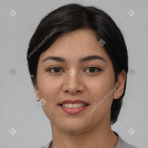 Joyful asian young-adult female with short  brown hair and brown eyes