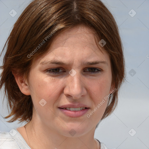 Joyful white adult female with medium  brown hair and blue eyes