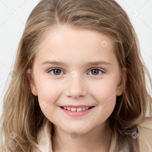 Joyful white child female with long  brown hair and grey eyes