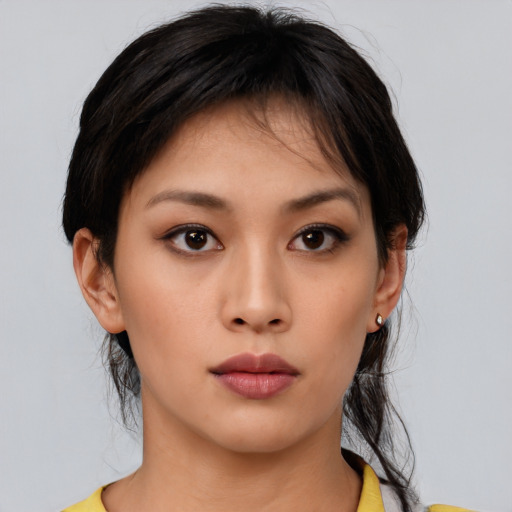 Neutral asian young-adult female with medium  black hair and brown eyes