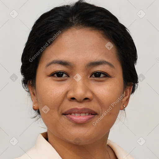 Joyful asian adult female with medium  brown hair and brown eyes