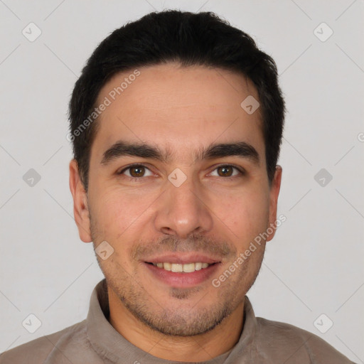 Joyful white young-adult male with short  black hair and brown eyes