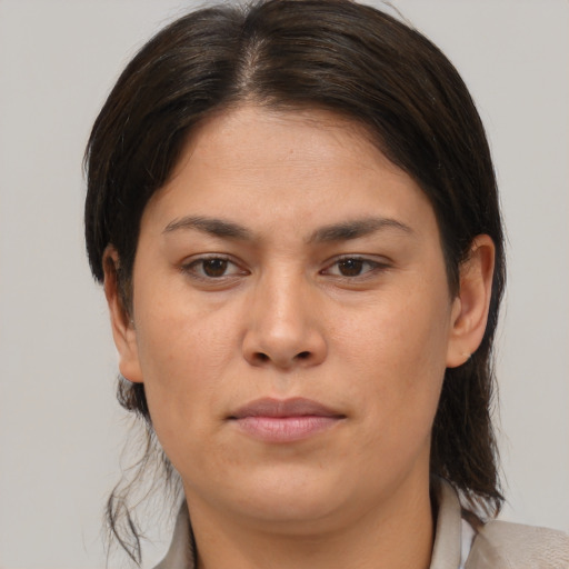 Neutral white young-adult female with medium  brown hair and brown eyes