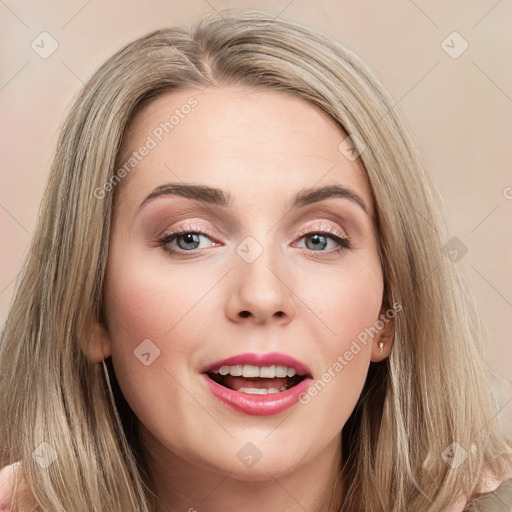 Joyful white young-adult female with long  brown hair and blue eyes