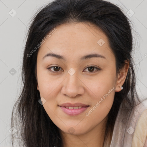 Joyful asian young-adult female with long  brown hair and brown eyes