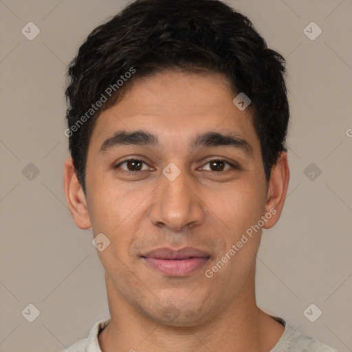 Joyful white young-adult male with short  black hair and brown eyes