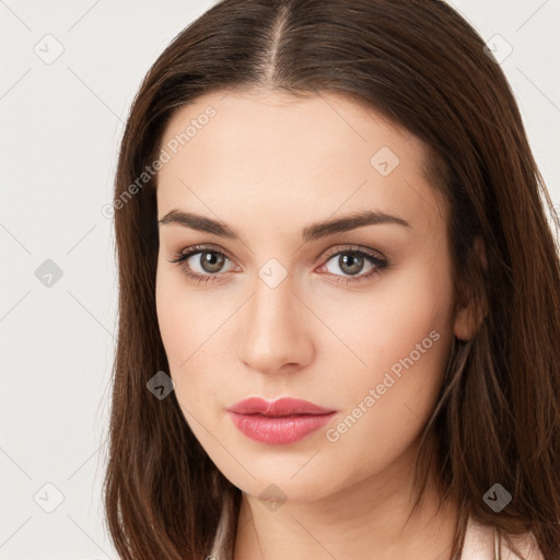 Neutral white young-adult female with long  brown hair and brown eyes