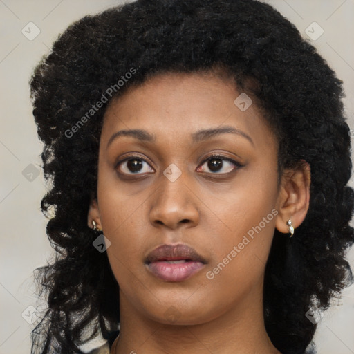 Neutral black young-adult female with long  black hair and brown eyes