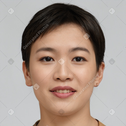 Joyful asian young-adult female with short  brown hair and brown eyes