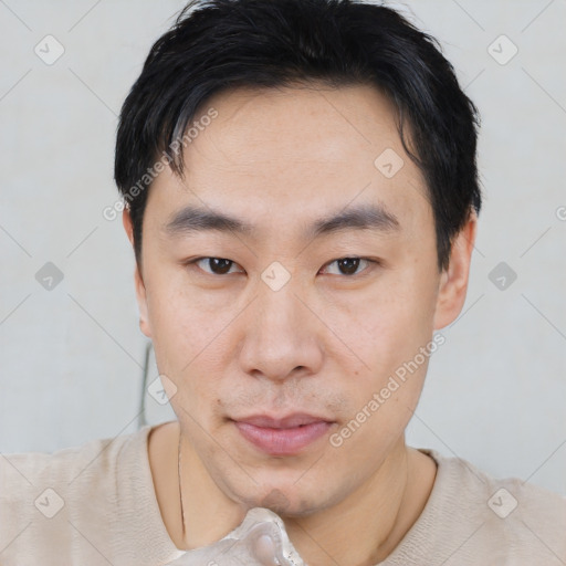 Neutral asian young-adult male with short  black hair and brown eyes