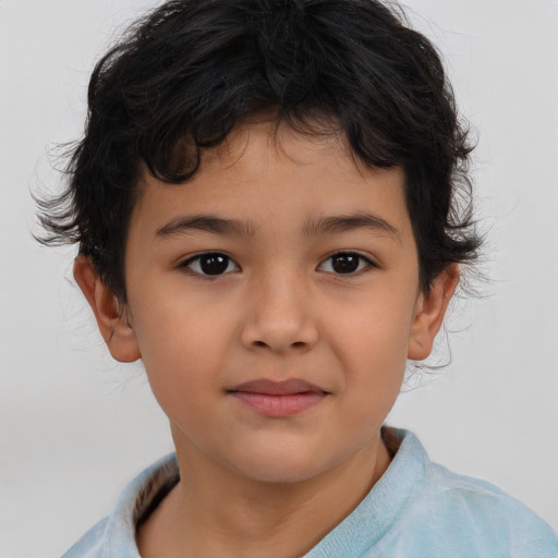 Joyful asian child male with short  brown hair and brown eyes