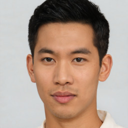 Neutral asian young-adult male with short  brown hair and brown eyes