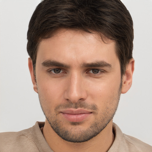 Neutral white young-adult male with short  brown hair and brown eyes