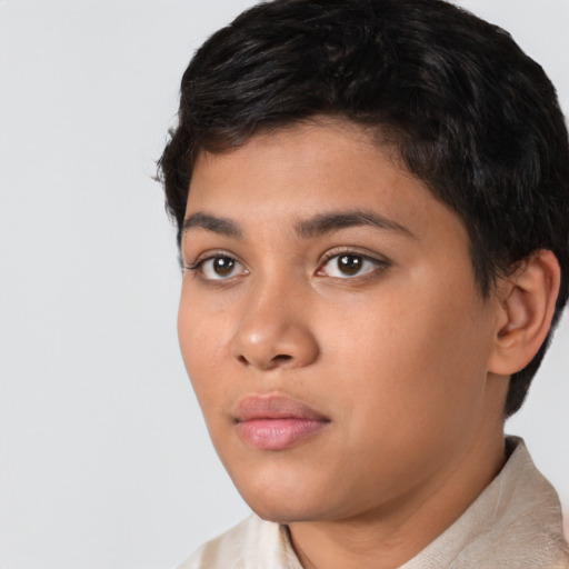 Neutral latino young-adult female with short  black hair and brown eyes
