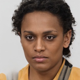 Neutral black young-adult female with short  brown hair and brown eyes