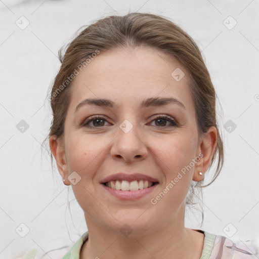 Joyful white young-adult female with medium  brown hair and grey eyes