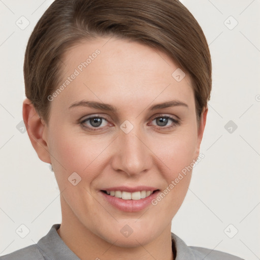 Joyful white young-adult female with short  brown hair and grey eyes