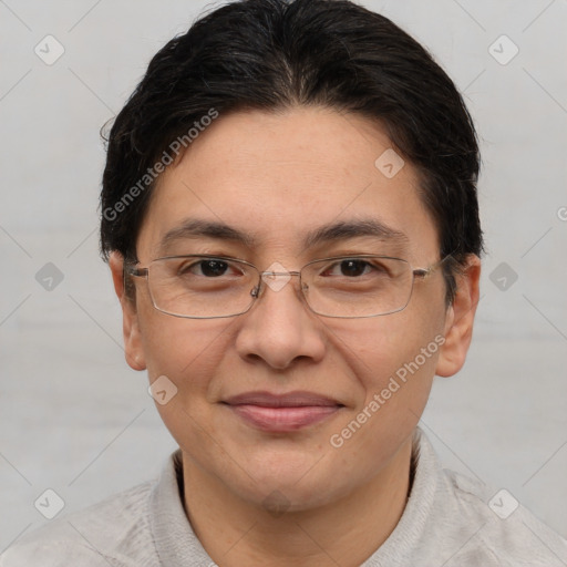 Joyful white adult female with short  brown hair and brown eyes