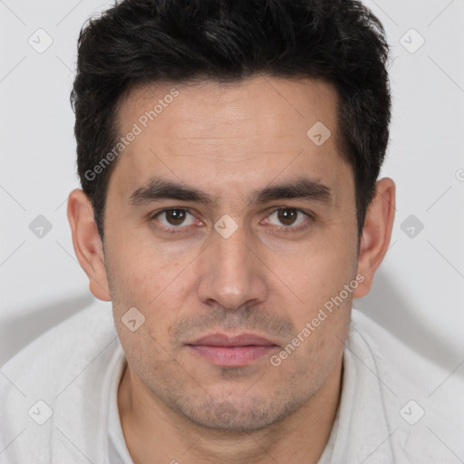 Joyful white young-adult male with short  brown hair and brown eyes