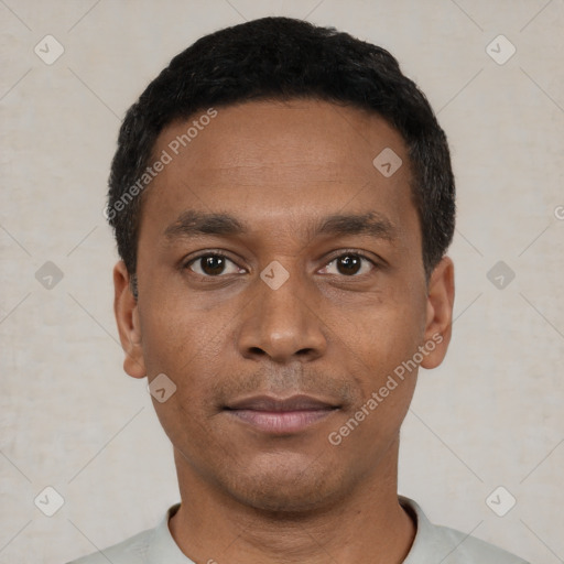 Neutral black young-adult male with short  black hair and brown eyes