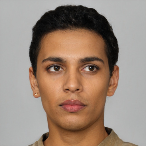 Neutral latino young-adult male with short  black hair and brown eyes