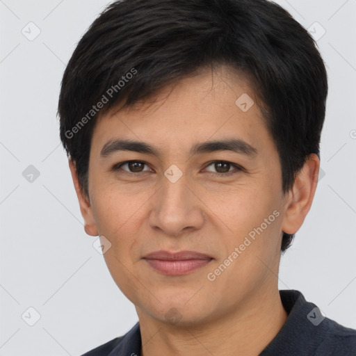 Joyful asian young-adult male with short  brown hair and brown eyes