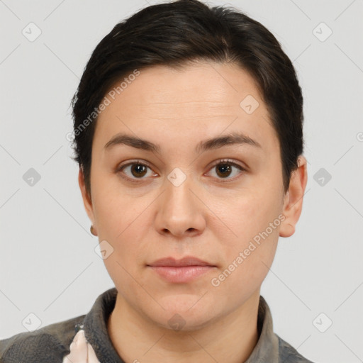 Neutral white young-adult female with short  brown hair and brown eyes