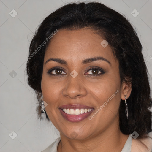 Joyful black young-adult female with medium  brown hair and brown eyes