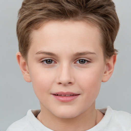 Joyful white child female with short  brown hair and brown eyes