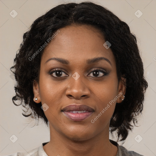 Joyful black young-adult female with medium  black hair and brown eyes