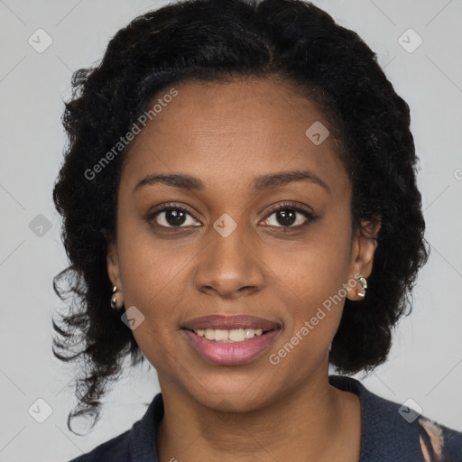 Joyful black young-adult female with medium  brown hair and brown eyes