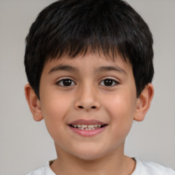 Joyful white child male with short  brown hair and brown eyes