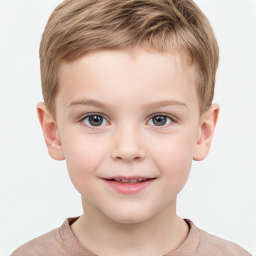 Joyful white child male with short  brown hair and grey eyes