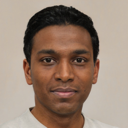 Neutral black young-adult male with short  black hair and brown eyes