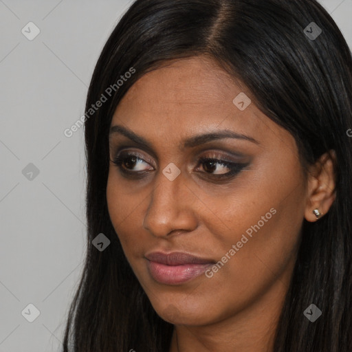 Joyful asian young-adult female with long  brown hair and brown eyes