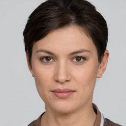 Neutral white young-adult female with short  brown hair and brown eyes