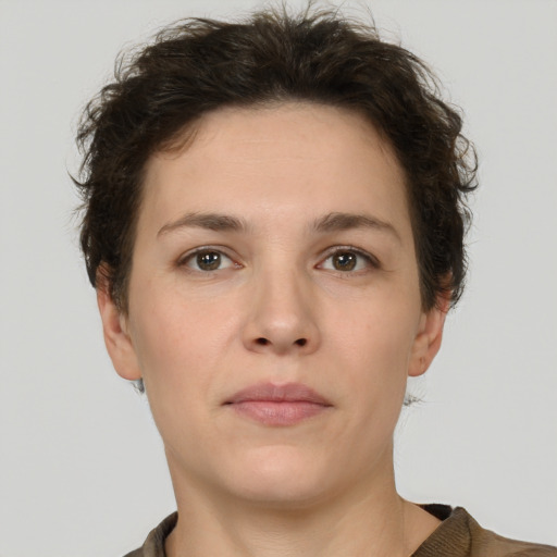 Neutral white young-adult female with short  brown hair and brown eyes