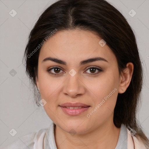 Joyful white young-adult female with medium  brown hair and brown eyes