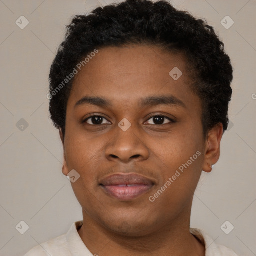 Joyful black young-adult male with short  brown hair and brown eyes