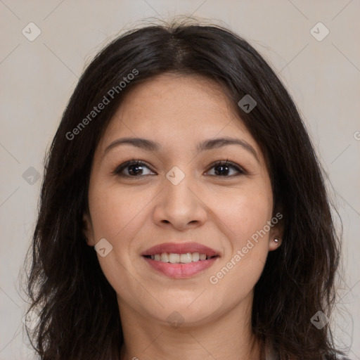 Joyful latino young-adult female with long  brown hair and brown eyes