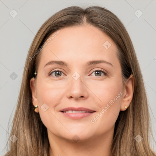 Joyful white young-adult female with long  brown hair and grey eyes