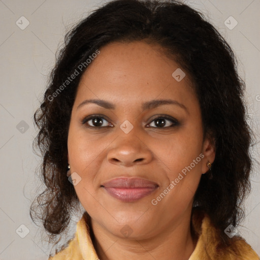 Joyful black young-adult female with medium  brown hair and brown eyes