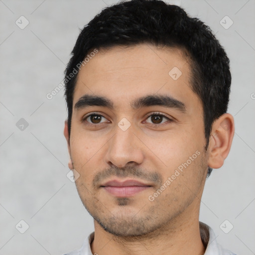 Neutral latino young-adult male with short  black hair and brown eyes