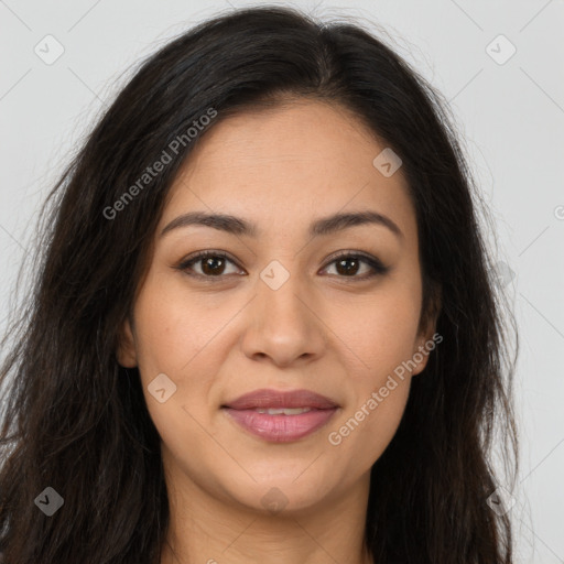 Joyful latino young-adult female with long  brown hair and brown eyes