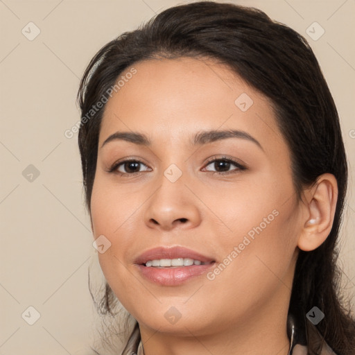 Joyful latino young-adult female with medium  brown hair and brown eyes