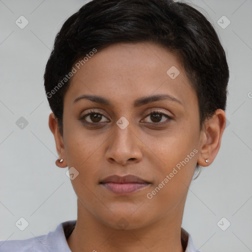 Joyful latino young-adult female with short  brown hair and brown eyes