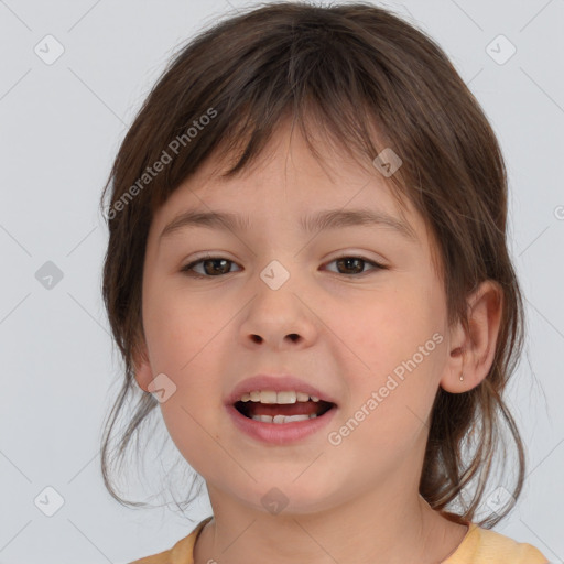 Joyful white child female with medium  brown hair and brown eyes