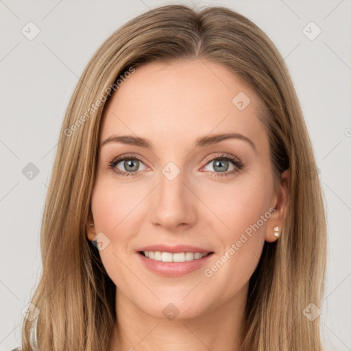 Joyful white young-adult female with long  brown hair and green eyes