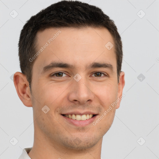 Joyful white young-adult male with short  brown hair and brown eyes