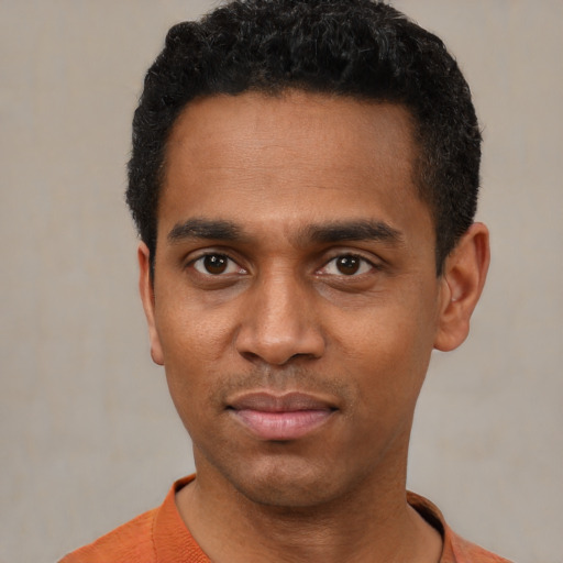 Neutral black young-adult male with short  black hair and brown eyes